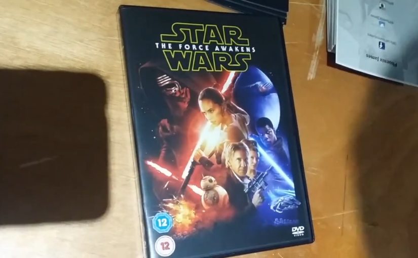 Phoenix James autographs new Star Wars: The Force Awakens DVD